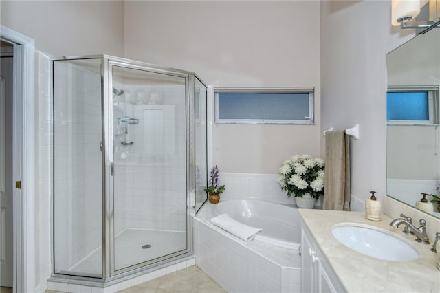 bathroom with vanity, shower with separate bathtub, and tile patterned flooring