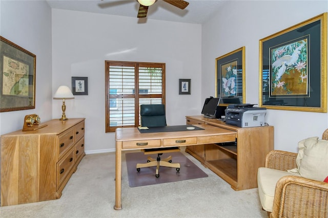 carpeted office with ceiling fan