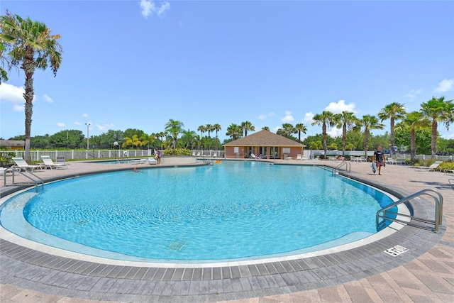 view of pool featuring a patio