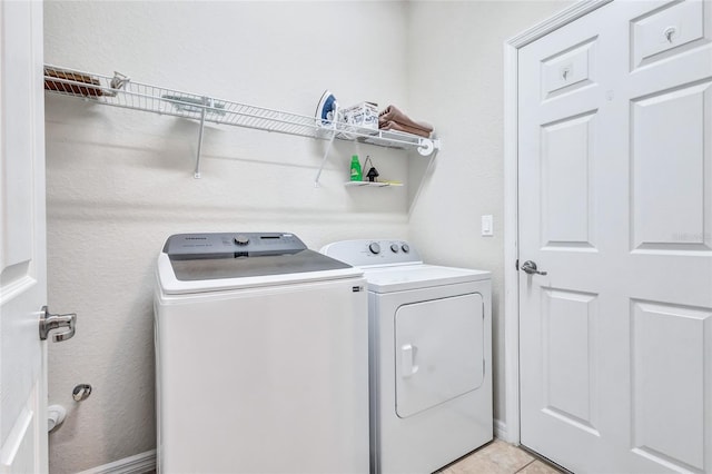 335 River Enclave Ct, Bradenton, FL 34212 - washroom with washing machine and dryer and light tile patterned flooring
