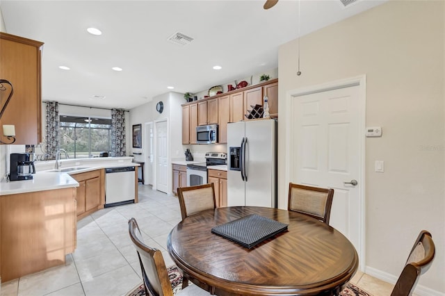 tiled dining space with sink