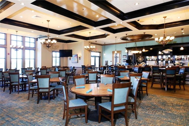 dining space featuring coffered ceiling, beamed ceiling, and crown molding