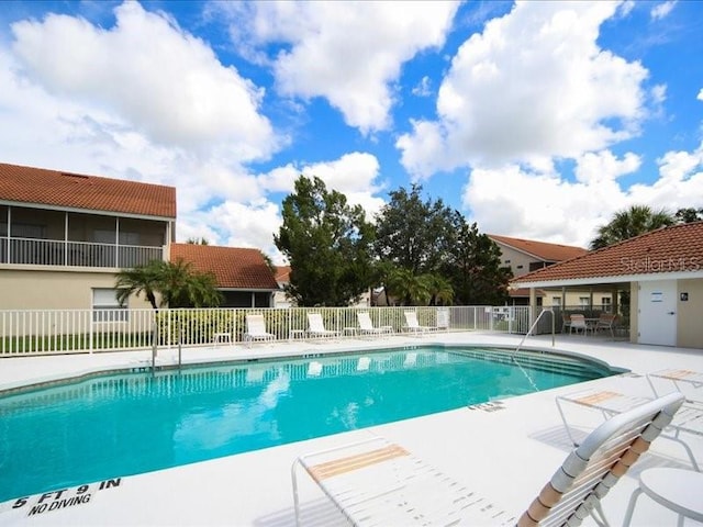 view of pool featuring a patio area