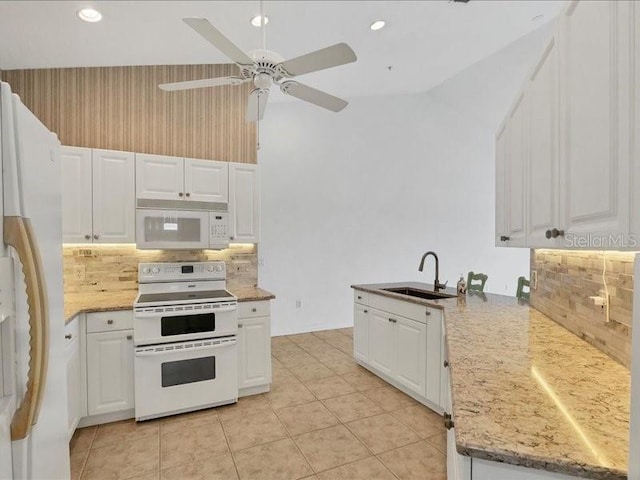 kitchen featuring white cabinets, white appliances, and sink