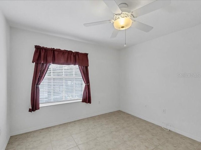 empty room featuring ceiling fan