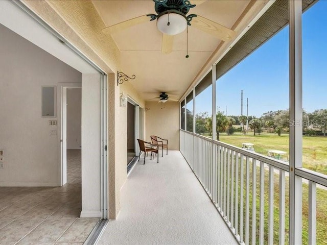 balcony featuring ceiling fan