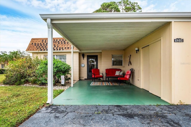 view of patio featuring a carport