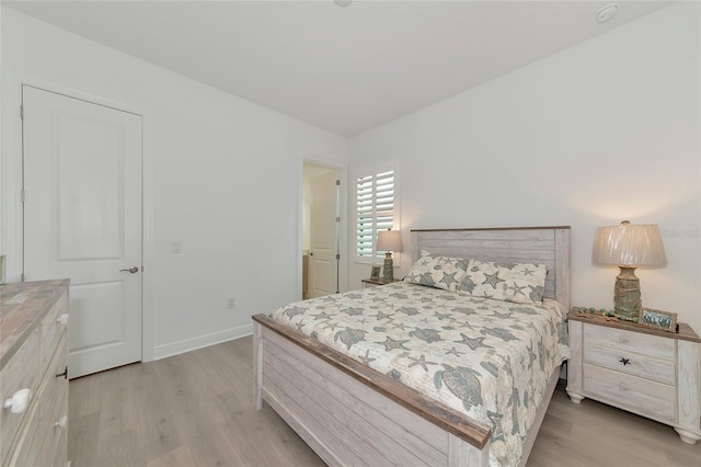 bedroom with light hardwood / wood-style flooring