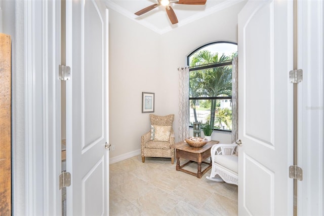 85 Spaniards Rd, Placida, FL 33946 - sitting room with a ceiling fan, ornamental molding, and baseboards