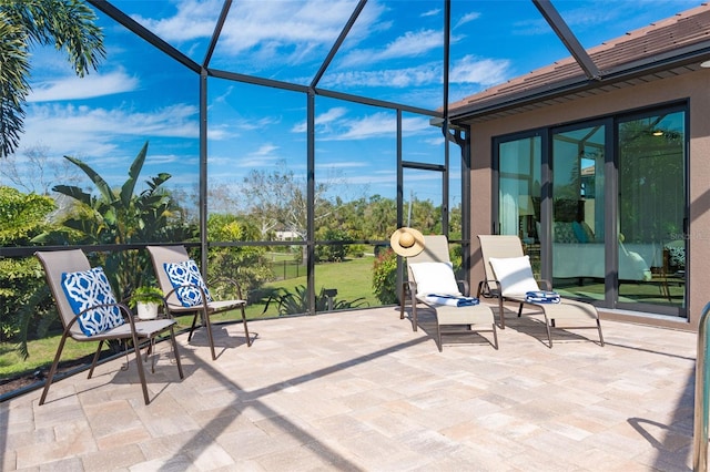 view of patio / terrace with a lanai