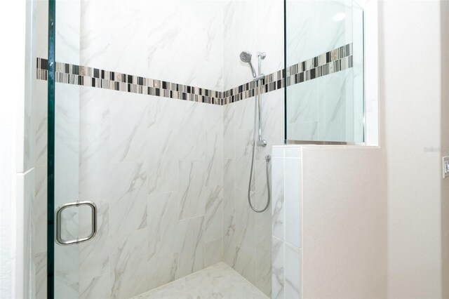 85 Spaniards Rd, Placida, FL 33946 - full bath featuring a marble finish shower