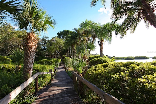 surrounding community featuring a water view