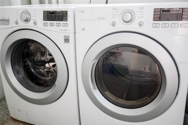 laundry area featuring independent washer and dryer