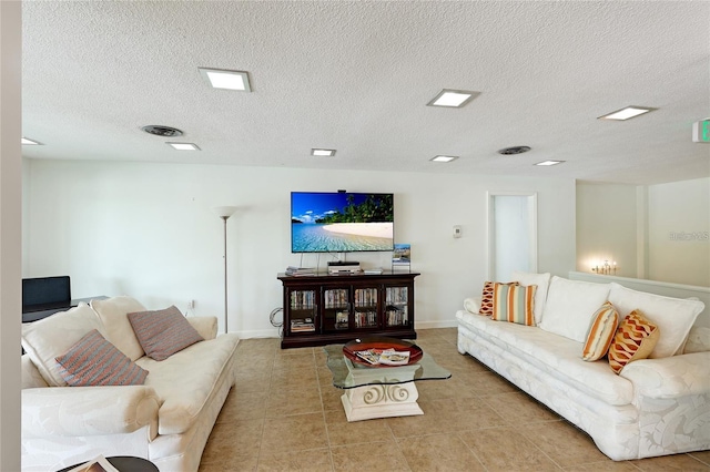 living room featuring a textured ceiling