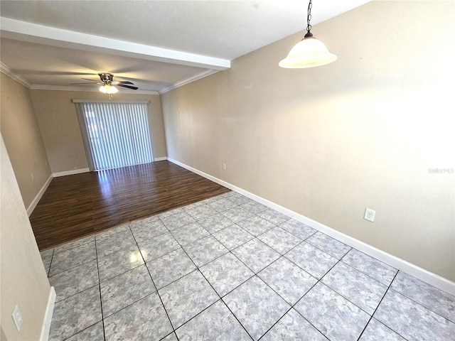 spare room with light wood-type flooring, ceiling fan, and crown molding