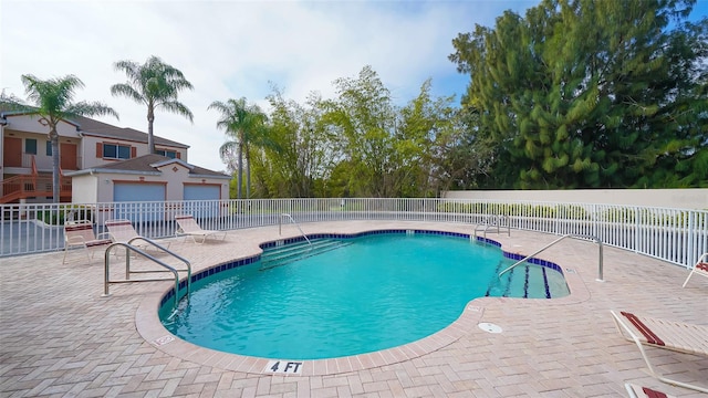 view of pool with a patio area