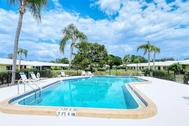 view of swimming pool featuring a patio