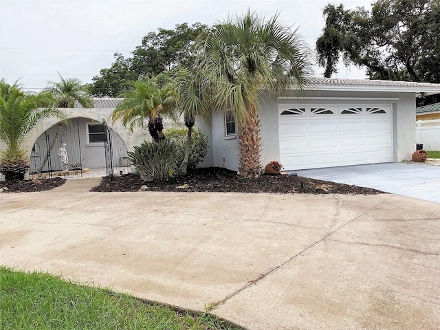 view of front of home with a garage