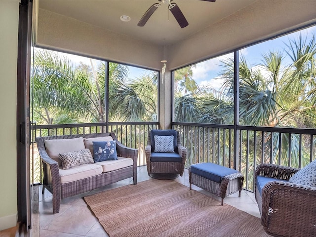 sunroom with ceiling fan and a healthy amount of sunlight