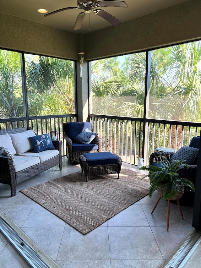 sunroom / solarium with ceiling fan