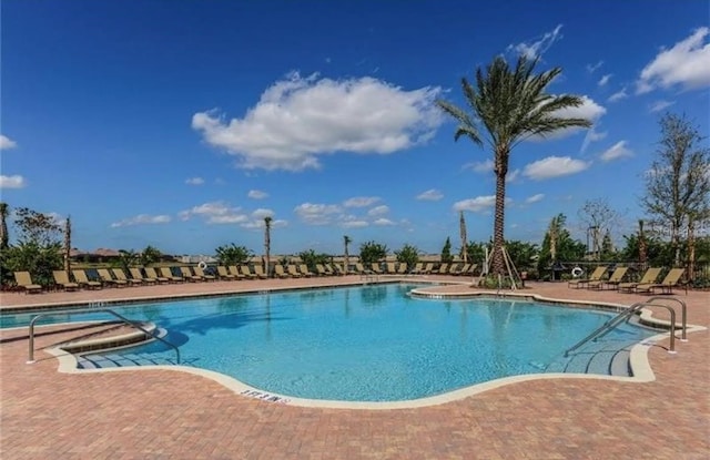 view of pool with a patio