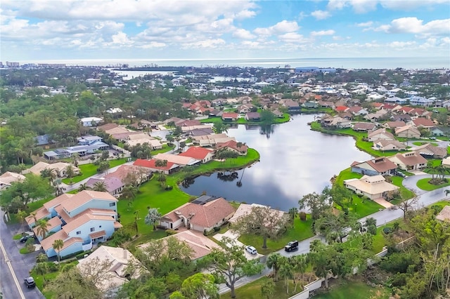 bird's eye view with a water view