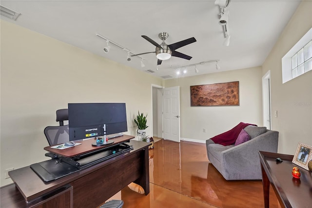 office featuring track lighting, hardwood / wood-style flooring, and ceiling fan