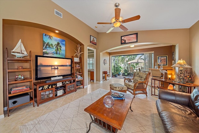 living room with light tile patterned flooring and ceiling fan