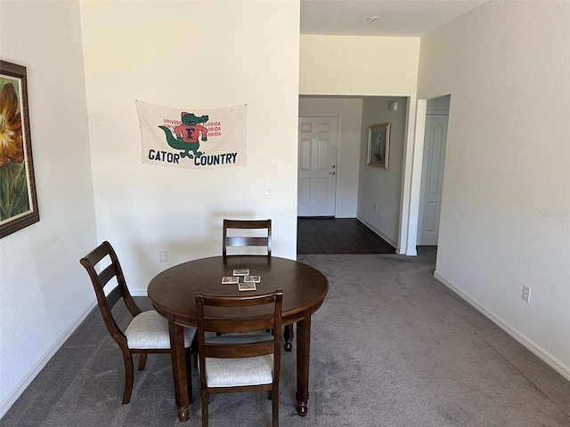 view of carpeted dining area