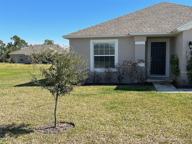 exterior space with a lawn