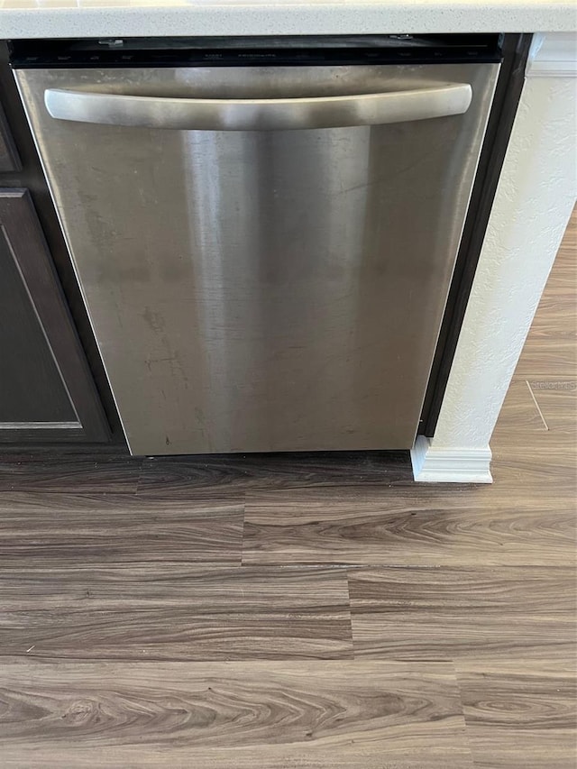 interior details with dishwasher and wood-type flooring