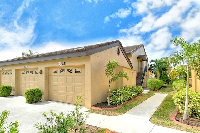 view of property exterior with a garage