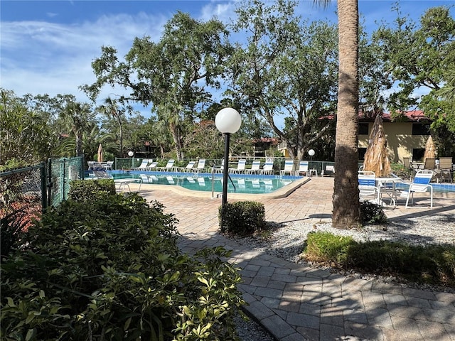 6447 Egret Ln Unit 413, Bradenton, FL 34210 - community pool with a patio