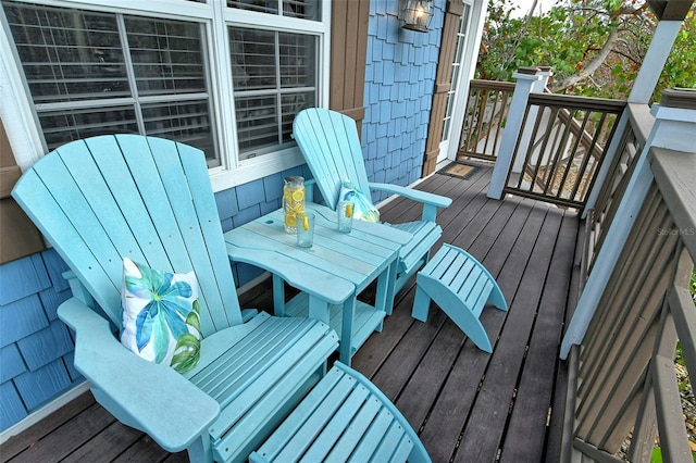 wooden balcony featuring a deck