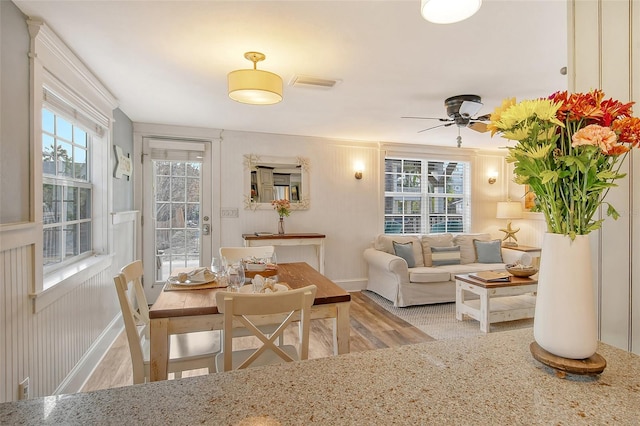 interior space featuring ceiling fan