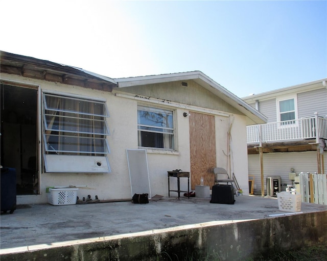 back of house featuring a patio area