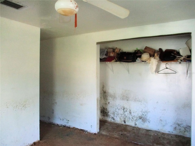 unfurnished room with visible vents and concrete floors