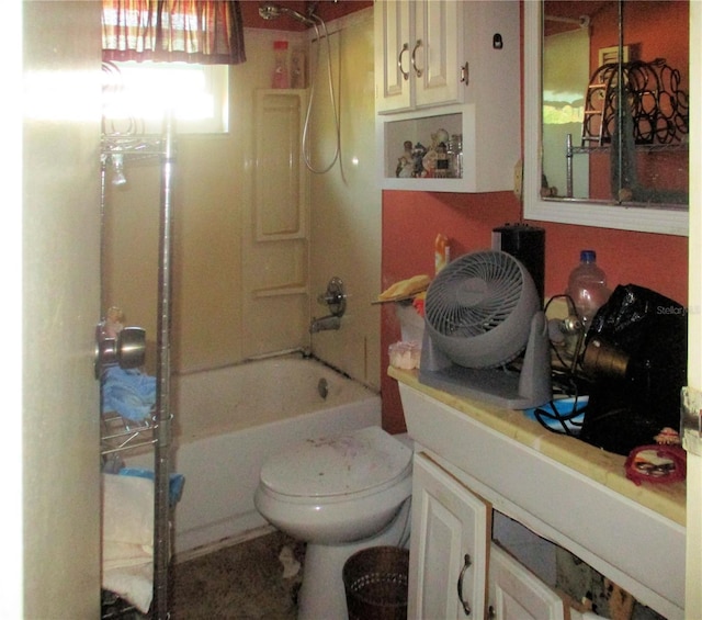 full bath with toilet, vanity, and shower / bathing tub combination