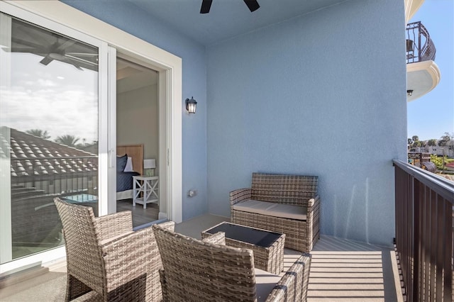 balcony featuring ceiling fan