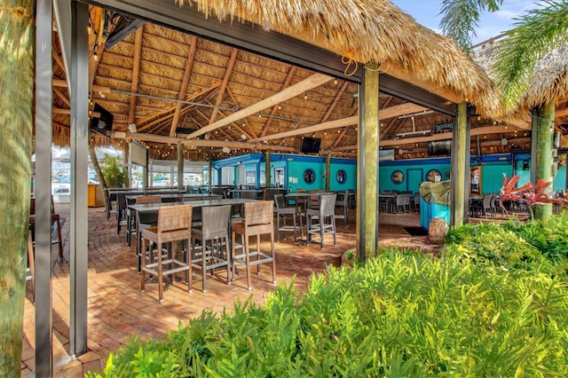 view of patio with a bar and a gazebo