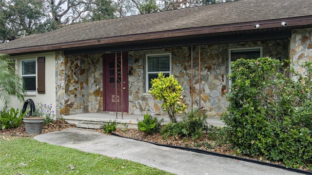 doorway to property with a porch