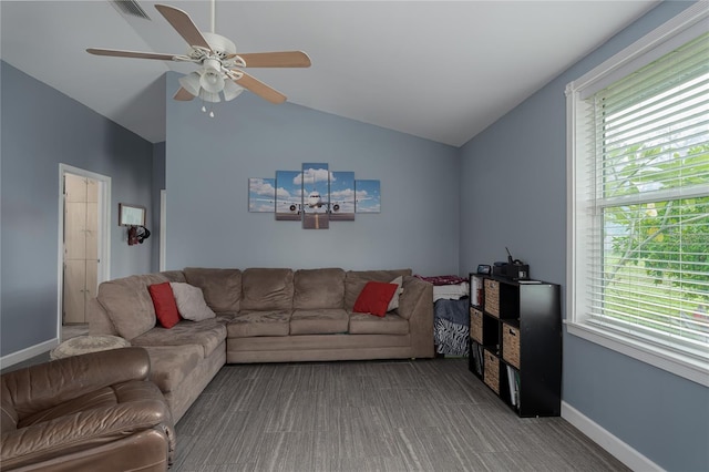 living room featuring ceiling fan and vaulted ceiling