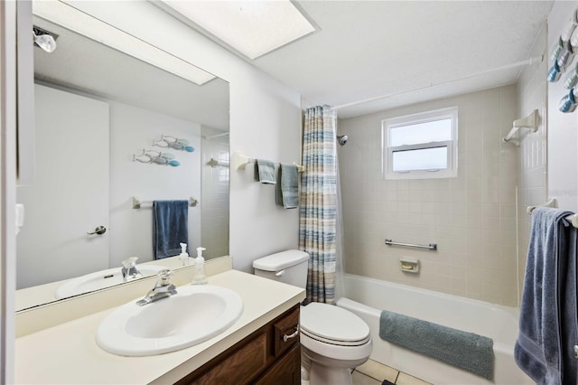 full bath featuring vanity, toilet, and shower / tub combo