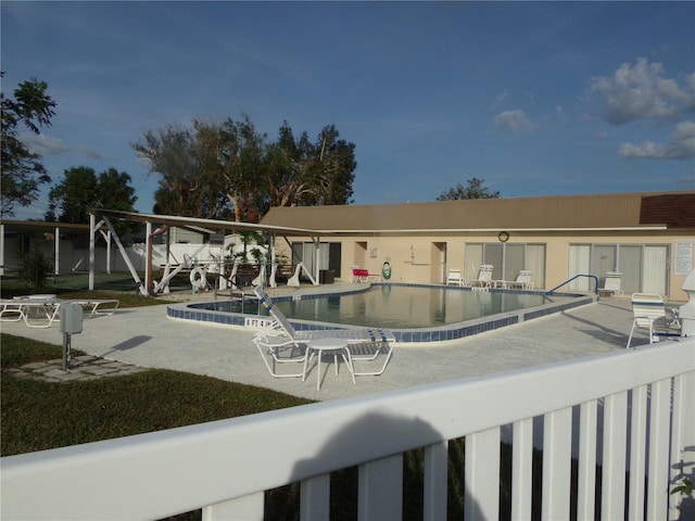 view of pool with a patio area