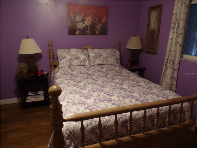 bedroom featuring hardwood / wood-style flooring