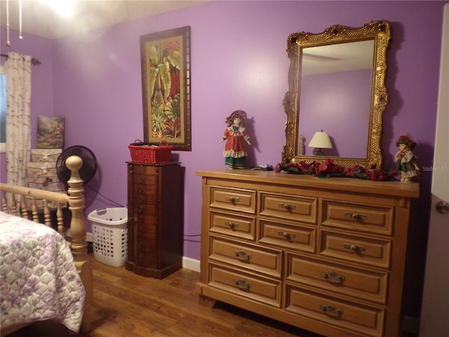 bedroom featuring wood-type flooring