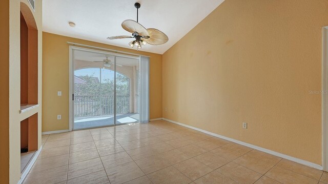 4134 Central Sarasota Pkwy Unit 1734, Sarasota, FL 34238 - unfurnished room with ceiling fan, arched walkways, light tile patterned flooring, baseboards, and vaulted ceiling
