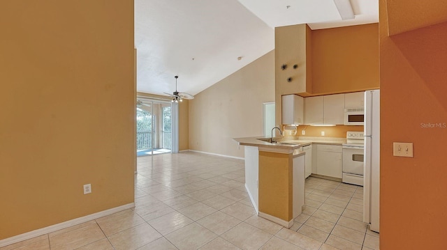 kitchen featuring kitchen peninsula, ceiling fan, light tile patterned floors, high vaulted ceiling, and white appliances