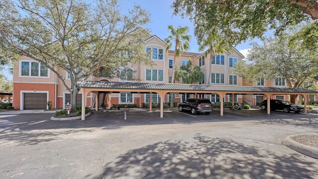 4134 Central Sarasota Pkwy Unit 1734, Sarasota, FL 34238 - view of property with covered parking