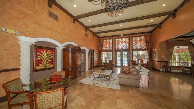 4134 Central Sarasota Pkwy Unit 1734, Sarasota, FL 34238 - community lobby with a towering ceiling, beamed ceiling, and recessed lighting